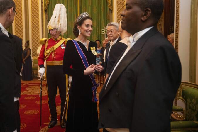 Kate Middleton, duchesse de Cambridge reçoit les membres du corps diplomatique à Buckingham Palace, le 11 décembre 2019. 