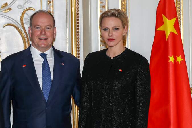 La princesse Charlene et le prince Albert II de Monaco pour un photocall tout en tendresse, lors de la réception du couple présidentiel chinois, le 24 mars 2019.