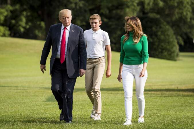 Barron Trump, sa mère et son père rentrant à la Maison Blanche à Washington le 19 août 2018