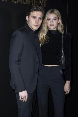 Brooklyn Beckham,  le fils de David et sa Victoria, avec sa petite amie  Nicola Peltz défilé Saint Laurent, à Paris le 25 février 2020.
