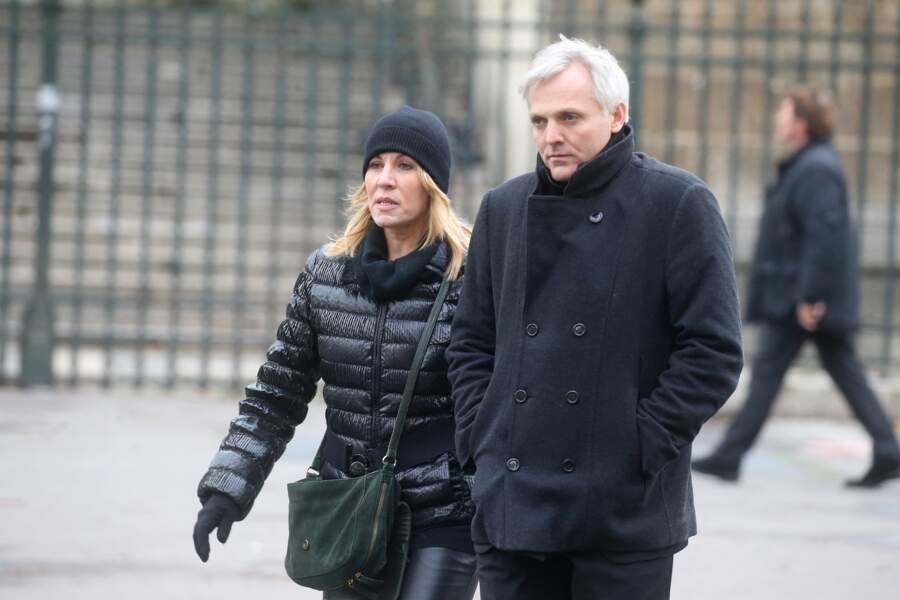 Mathilde Seigner et Mathieu Petit à la sortie de l'église de la Madeleine après les obsèques de Johnny Hallyday, à Paris, le 9 décembre 2017.