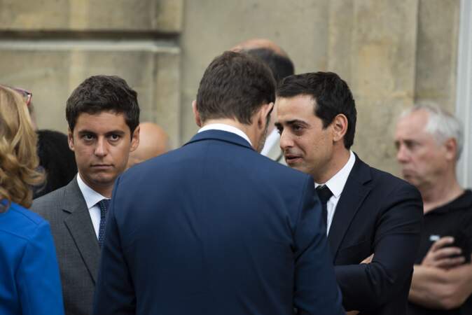 Gabriel Attal et Stéphane Séjourné, au côté de Christophe Castaner, lors d'un discours aux armées d'Emmanuel Macron l'Hôtel de Brienne, siège du ministère des Armées, le 13 juillet 2019.