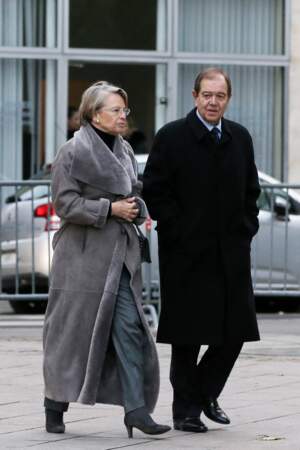 Michèle Alliot-Marie et son compagnon Patrick Ollier aux obsèques de Jacques Barrot à Paris, le 8 décembre 2014