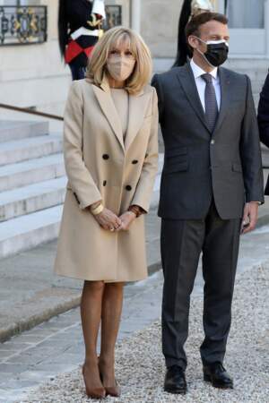 Emmanuel Macron et son épouse Brigitte Macron lors d'un déjeuner avec le président Frank-Walter Steinmeier et sa femme Elke Buedenbender à l'Elysée, le 26 avril 2021