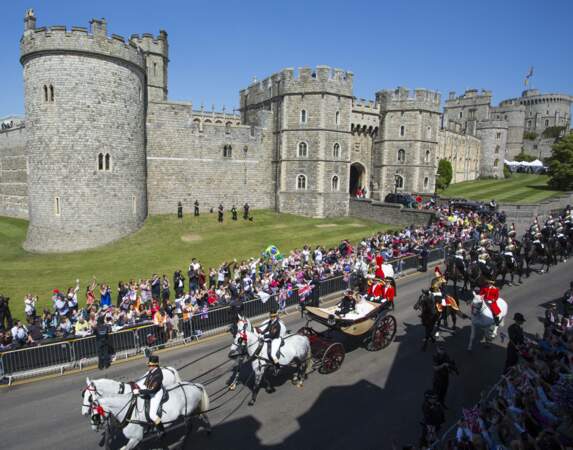 19 mai 2018 : Le prince Harry et Meghan Markle quittent la château de Windsor à bord d'un carrosse royal