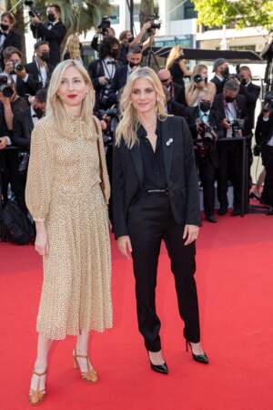 Jessica Hausner et Mélanie Laurent très chics en Céline, pour la montée des marches du film "Benedetta" lors du 74ème Festival International du Film de Cannes, le 9 juillet 2021