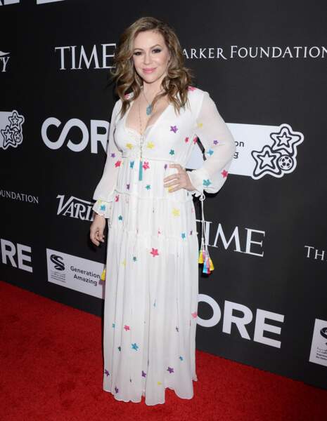Alyssa Milano resplendissante dans une longue robe bohème au photocall du dixième anniversaire du gala caritatif "Core", à Los Angeles, le 15 janvier 2020