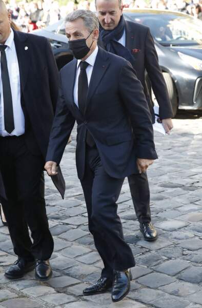 Nicolas Sarkozy arrive à la messe funéraire en hommage à Bernard Tapie en l'église Saint-Germain-des-Prés à Paris, le 6 octobre 2021