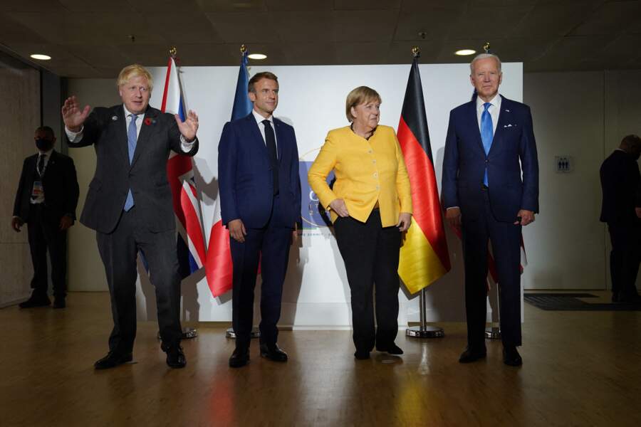 Boris Johnson, Angela Merkel, et Emmanuel Macron. 