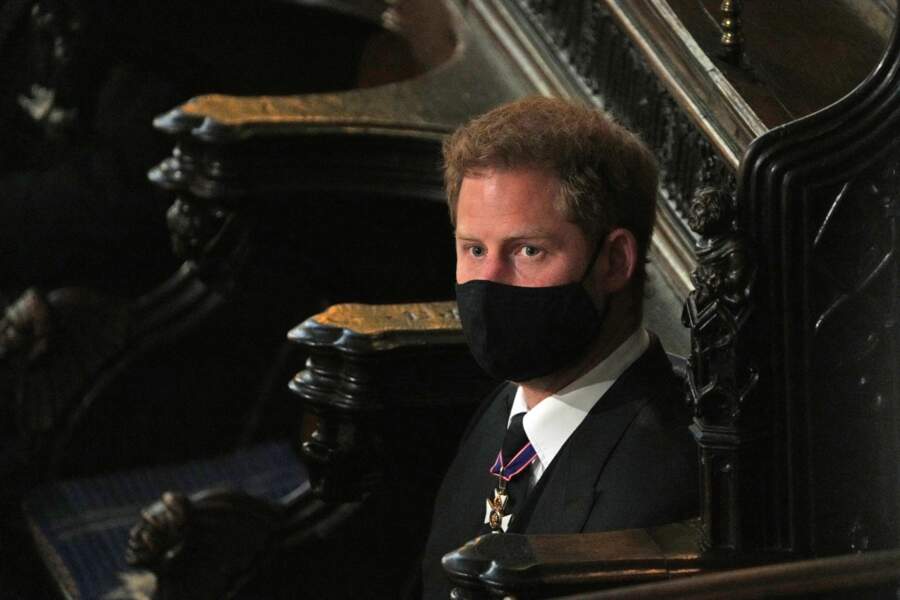 Prince Harry alone, at the funeral of Prince Philip, Duke of Edinburgh.