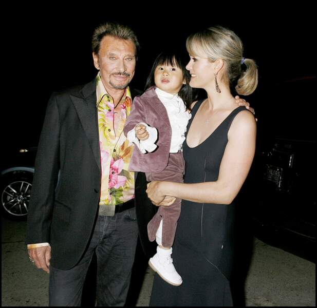Johnny et Laeticia Hallyday et leur fille Jade lors d'un concert en l'honneur de Christian Audigier