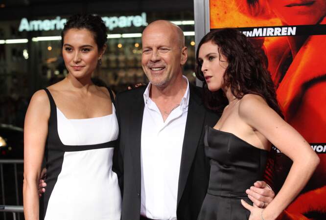 Désormais marié au mannequin Emma Heming, Bruce Willis garde des liens très proches avec ses filles, ici Rumer Willis lors de l'avant première du film Red à Los Angeles.