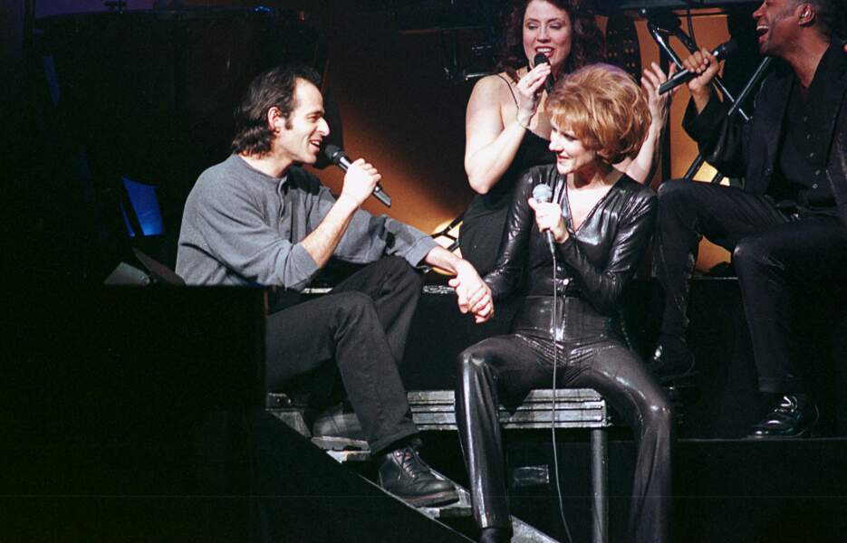 Jean-Jacques Goldman et Céline Dion en concert au Midem à Cannes, le 23 janvier 1996.