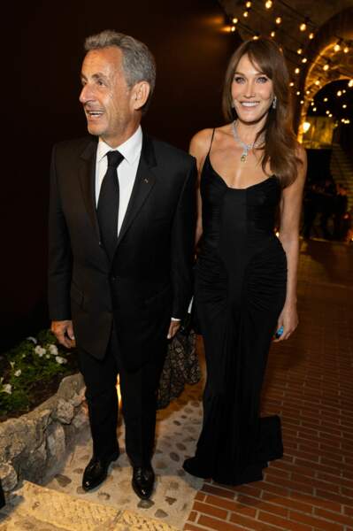Carla Bruni et son mari Nicolas Sarkozy accordent leur tenue à la soirée "Women In Motion" par Kering au Chateau de la Castre 