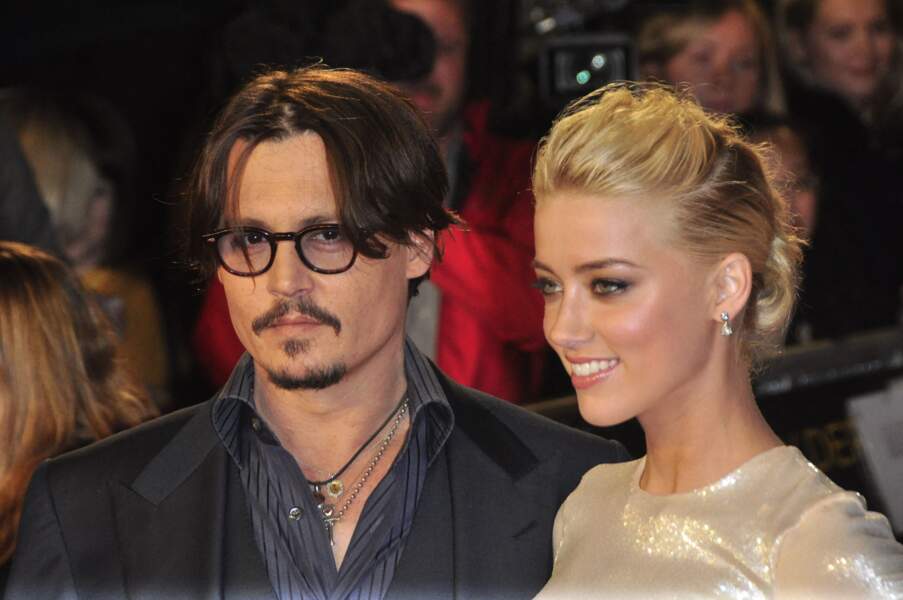Amber Heard et Johnny Depp, en 2011, à la première de The Rum Express, à Londres (Angleterre), le film où les futurs époux se sont rencontrés 