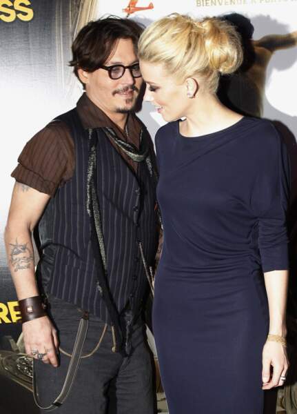 Amber Heard et Johnny Depp, en 2O11, très complices à l'avant-première du film Rhum Express, au Gaumont des Champs-Élysées à Paris