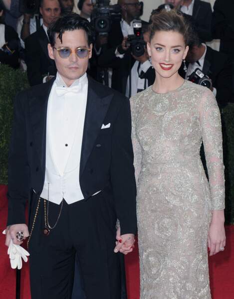 Amber Heard et Johnny Depp, en 2014, en tenues d'apparat pour le Meet Ball de New York (États-Unis)