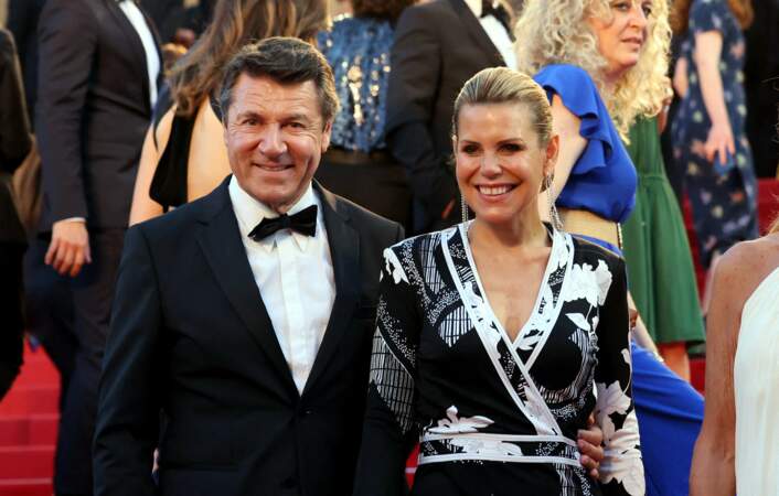 Christian Estrosi, maire de Nice, et son épouse, Laura Tenoudji-Estrosi lors de la montée des marches du film « Mascarade  » le 27 mai 2022.