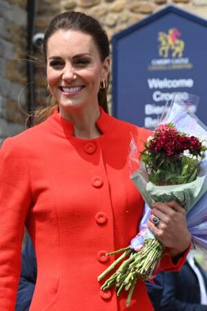 Kate Middleton en robe-manteau orangé à l'occasion du jubilé de platine de la reine d'Angleterre, le 4 juin 2022. 