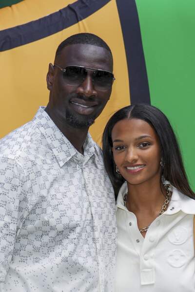Omar Sy et sa fille Selly en total look Louis Vuitton, le 23 juin 2022.