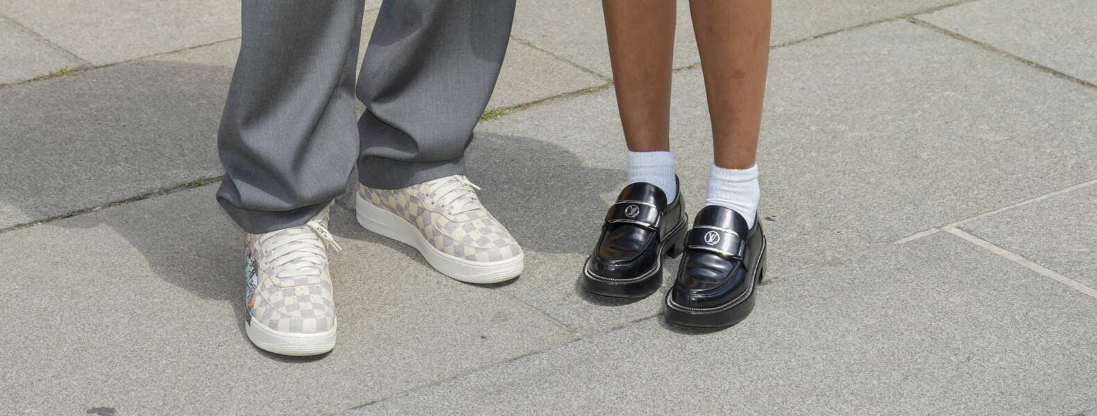 Tel père, tel fille... Omar Sy et sa fille Selly Sy portent des chaussures Louis Vuitton, le 23 juin 2022