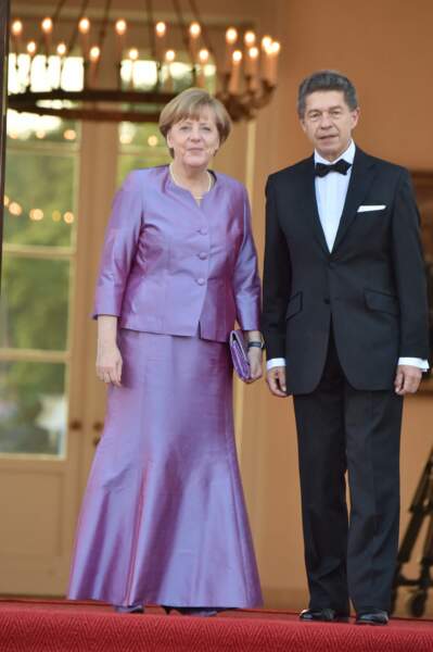 Angela Merkel en robe violette à son arrivée au dîner d'état au château Bellevue à Berlin, le 24 juin 2015. 