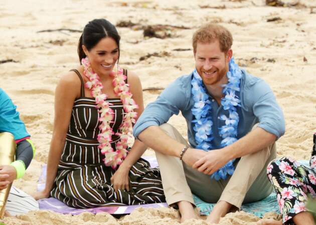 Le prince Harry et Meghan Markle enceinte lors d'une visite de la plage Bondi Beach à Sydney, en octobre 2018