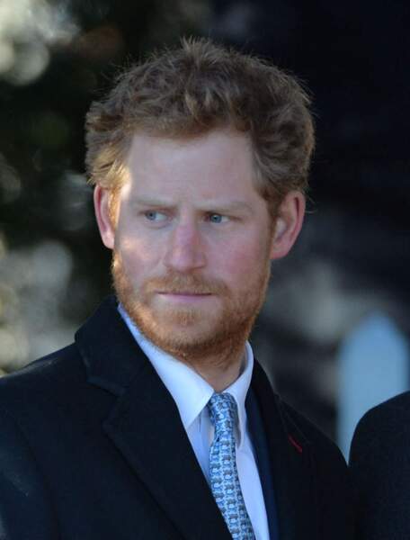 Le prince Harry, barbu, au Noel de la famille royale à Sandringham, en 2013