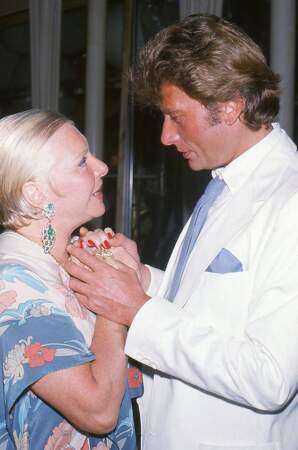 Johnny Hallyday et sa marraine Line Renaud lors du mariage d'Eddy Barclay, en juin 1984