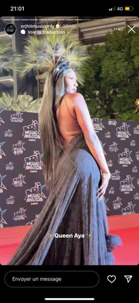 Aya Nakamura au top du glamour dans une longue robe noire échancrée dans le dos lors de son arrivée à la 24ème cérémonie des NRJ Music Awards à Cannes, le vendredi 18 novembre