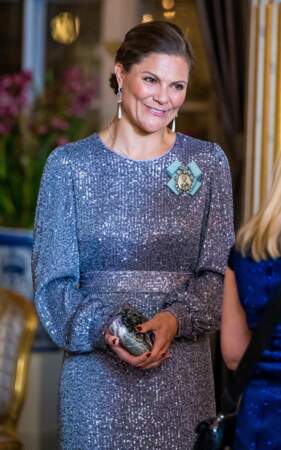 Avec un chignon bas, Victoria de Suède rejoint la réception organisée au palais royal à Stockholm le 29 novembre 2022
