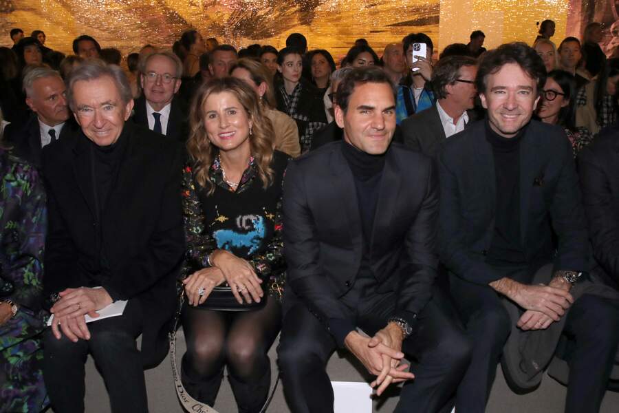 Bernard Arnault, Mirka Federer, Roger Federer et Antoine Arnault rejoignent le front row du défilé Dior - collection Haute-Couture Printemps-été 2023 - à Paris, le 23 janvier 2023