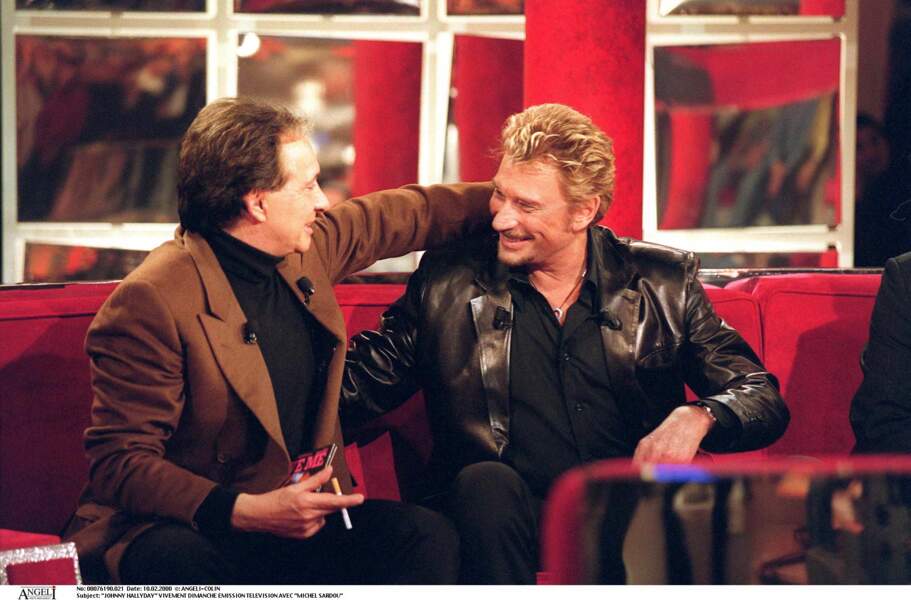Johnny Hallyday et Michel Sardou, dans l'émission "Vivement Dimanche", le 10 février 2000