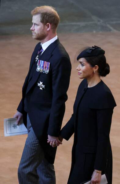 14 septembre 2022 : Harry et Meghan lors de la procession cérémonielle du cercueil de la reine Elisabeth II du palais de Buckingham à Westminster Hall à Londres