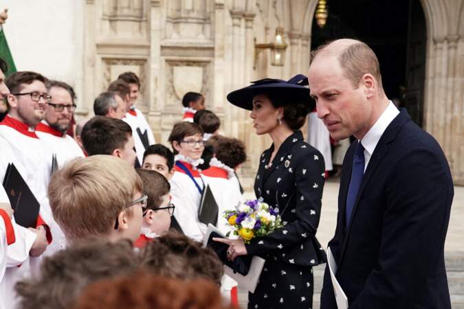 Le prince William et son épouse Kate Middleton saluent la foule après le service annuel du Commonwealth Day à l'Abbaye de Westminster, le lundi 13 mars 2023