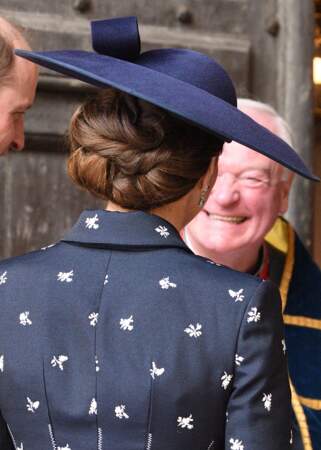 Kate Middleton adopte le chignon tressé lors du Commonwealth à l'abbaye de Westminster à Londres, le 13 mars 2023   