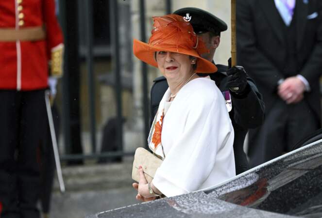 L'ancienne Première ministre britannique Theresa May arrive pour assister à la cérémonie de couronnement du roi Charles III, à l'abbaye de Westminster, à Londres, le samedi 6 mai 2023.