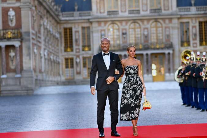 Didier Drogba et Gabrielle Lemaire arrivent au dîner d'État organisé à Versailles en l'honneur du roi Charles III et Camilla, ce mercredi 20 septembre 2023 