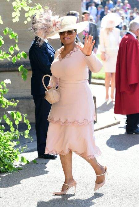 Oprah Winfrey fait partie du cercle rapproché de Meghan Markle et du prince Harry. Invitée à leur mariage, comme ici en mai 2018, elle se trouve être leur voisine en Californie.