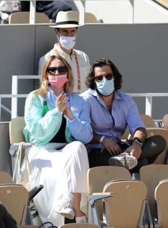 Chloé Jouannet et son ami Nikola Lange, créateur de la série Derby Girl dans les gradins du tournoi Roland Garros à Paris