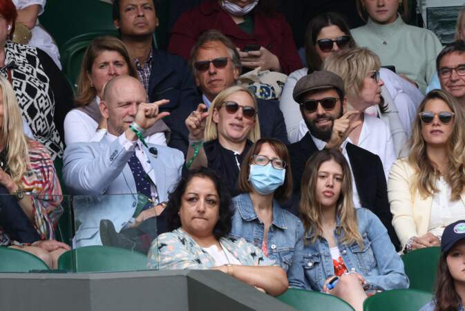 Zara Phillips et Mike Tindall partagent de bons fous rires lors du tournoi de Wimbledon, à Londres, le 7 juillet 2021
