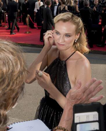 Diane Kruger radieuse avec un maquillage glowy à Cannes, le 7 juillet 2021.