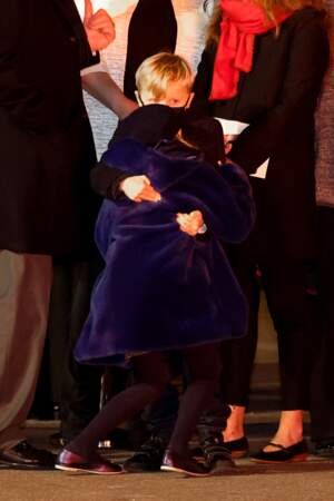 La princesse Gabriella dans les bras de son frère jumeau, Jacques lors de la Sainte-Dévote, Patronne de Monaco, le 26 janvier 2022