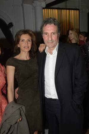 Jean-Jacques Bourdin et sa femme Anne Nivat, à une soirée Néo Burlesque à l'hôtel Vernet à Paris le 20 mars 2014.  
