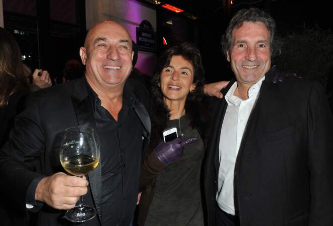 Jean-Jacques Bourdin et sa femme Anne Nivat aux côtés de Bruno Mangel, pour célébrer les 9 ans de L'Aventure, le 13novembre 2012 à Paris.