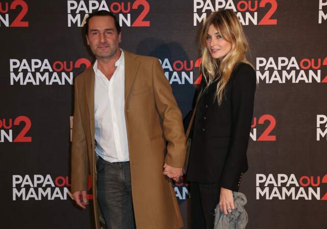Depuis 2015, le couple assiste régulièrement à des événements main dans la main. Ici lors de l'avant-première du film "Papa ou Maman 2" à Paris, en décembre 2016. 