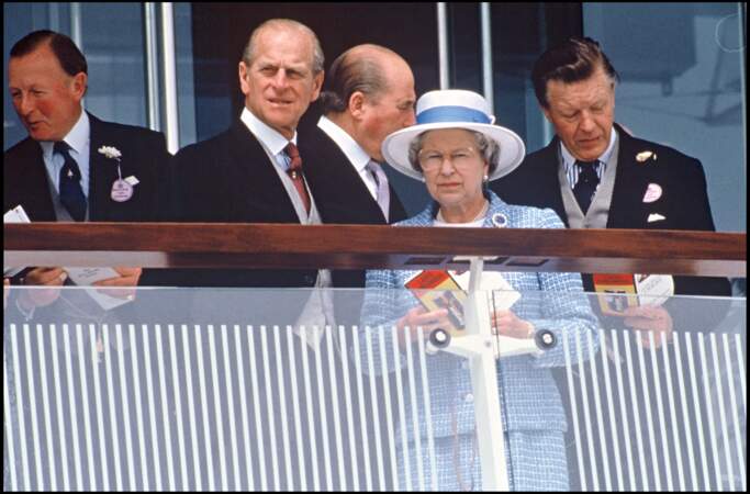 Le prince Philip et la reine Elizabeth II, lors d'une course hippique, à Epstom, en Angleterre, en 1993.