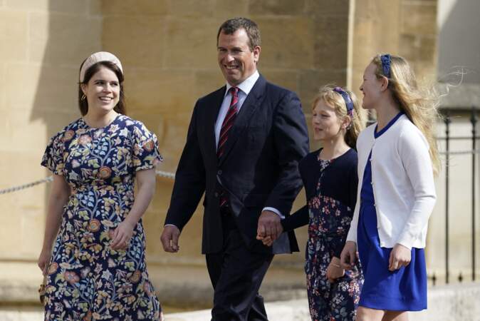 La Princesse Eugenie, Peter Philips et ses filles, Isla and Savannah sortent de la chapelle Saint-Georges de Windsor après la messe de Pâques, le 17 avril 2022. 
