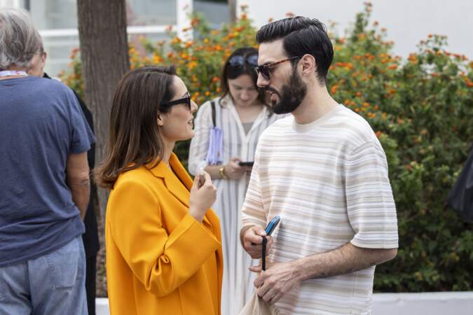 Moment de complicité entre Sofia Essaïdi et son chéri Adrien Galo en marge du Photocall du film "Nostalgia" lors du 75ème Festival International du Film de Cannes, le 25 mai 20222.
