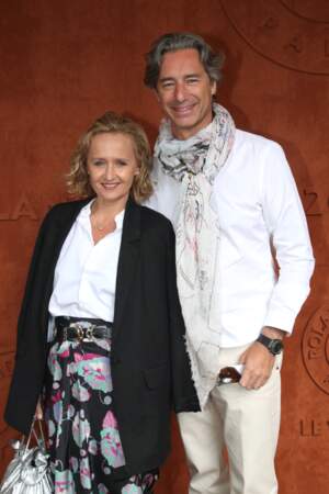 Laurent Solly (directeur général de Facebook France) et sa femme Charlotte Chandellier (journaliste) au village (Jour 8) lors des Internationaux de France de Tennis de Roland Garros 2022 à Paris, France, le 29 mai 2022.